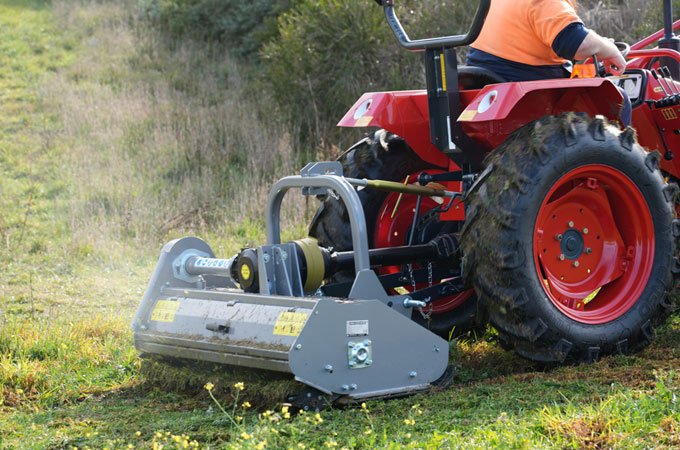 AGMAX-Tractor-Flail-Mower-4 AGMAX flail mowers can cut through heavy undergrowth, mulching at the same time.
