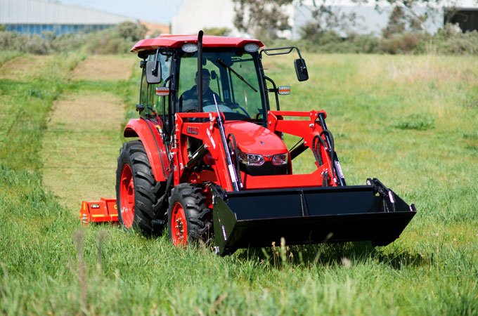 APOLLO-604-AC-CAB-TRACTOR-13 A quiet A/C cabin for mowing in all weather conditions.